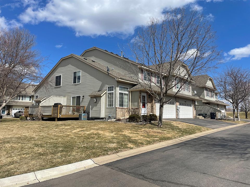 End unit with large side yard and sidewalks