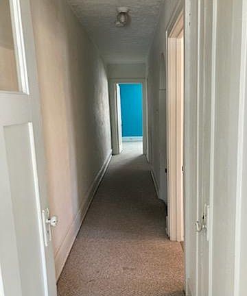 2 bedrooms off the upstairs hallway 12x12 and 14x14 rooms, plenty of closet space and sunroom.