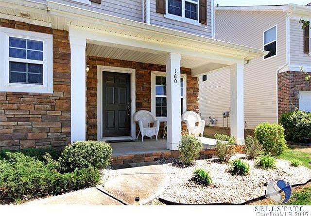 Lovely Front porch and lush green gardens