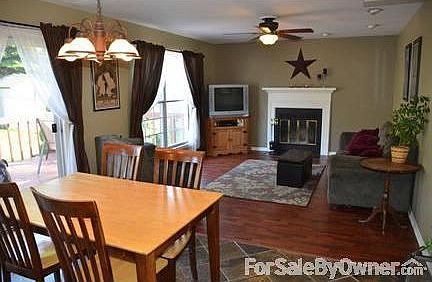 Family Room
						:
						Fireplace, slate hearth & wood surround & mantle, recessed lighting