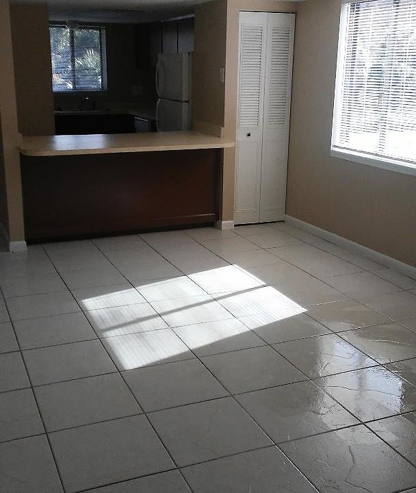 Floor still a little wet from mopping.