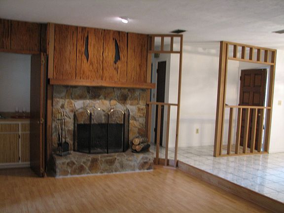 Living room fireplace and foyer