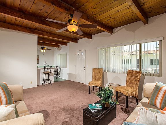 large living room with high ceilings throughout