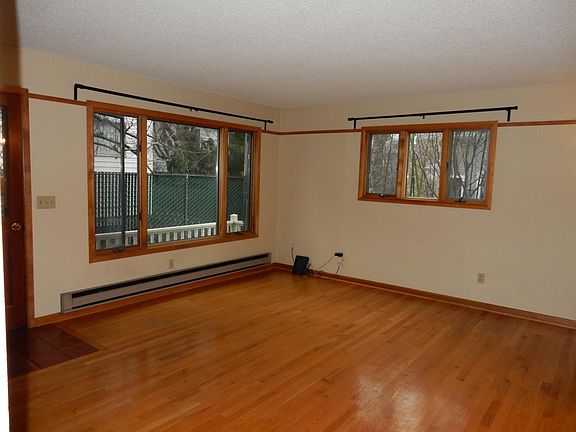 Living room with large windows and lots of natural light.