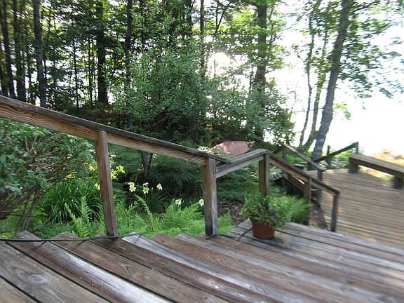 Looking down deck steps to lake