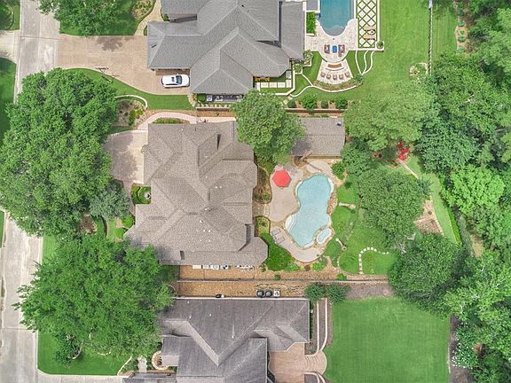 The property sits on an almost half acre lot with lots of room in the Backyard Oasis to entertain and enjoy the Outdoors! There is a wrought iron fence and gate which allows you direct access to the trails and quick access to the neighborhood park an