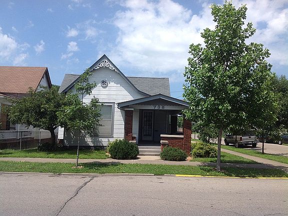 Front view w/porch 8th St