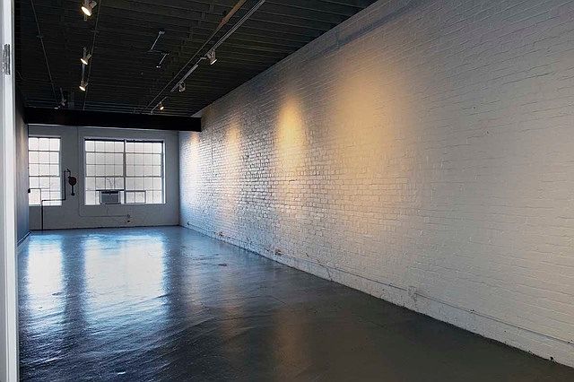 Main loft space looking toward front windows.