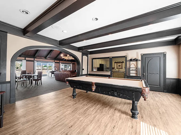 Play a Game of Billiards at the Clubhouse
