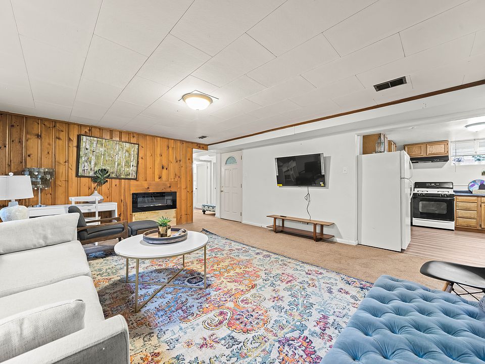 Spacious open living area with smartTV and gas fireplace.