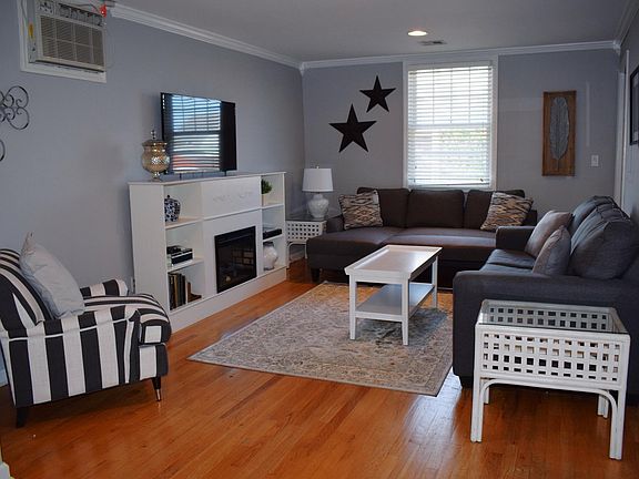Living area with pullout queen and full futon sleeps 4
