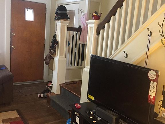 front door and steps to second floor