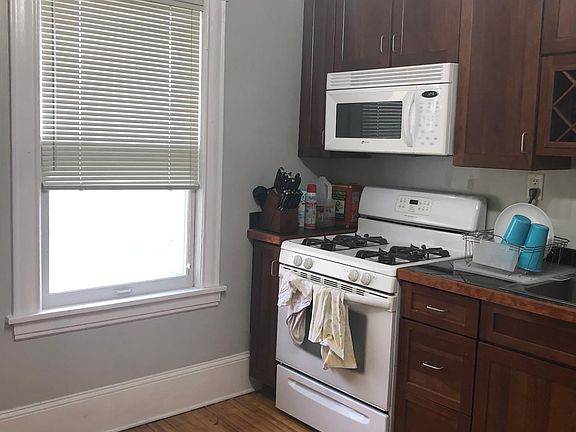 Gas Stove. Granite Tile Countertops.