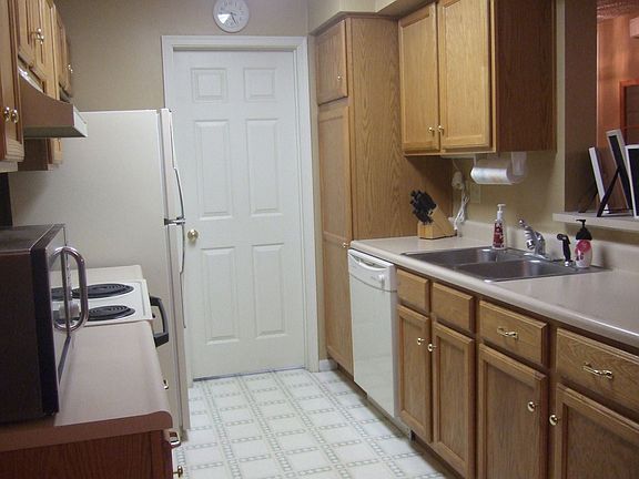 Galley Kitchen with attached laundry