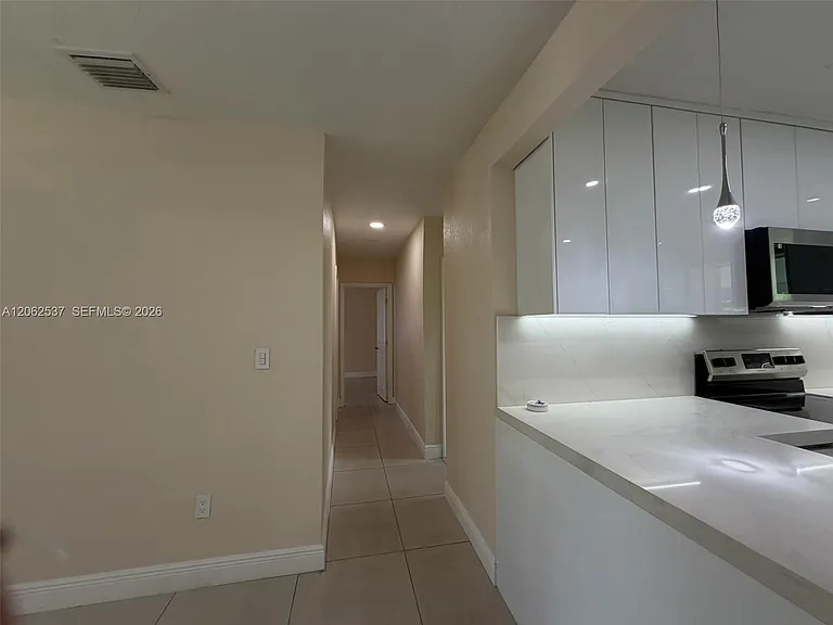9016 NW 35th Ct — Photo 13