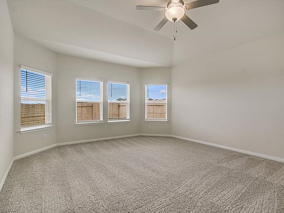 Get plenty of natural lighting in the primary bedroom.