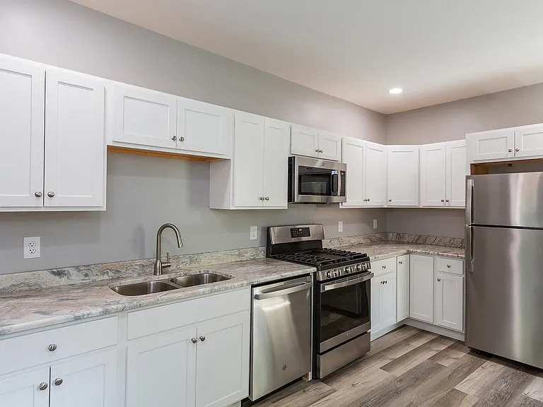 Remodeled kitchen two years ago with granite counters, gas stove and dishwasher. Lots of upgrades.