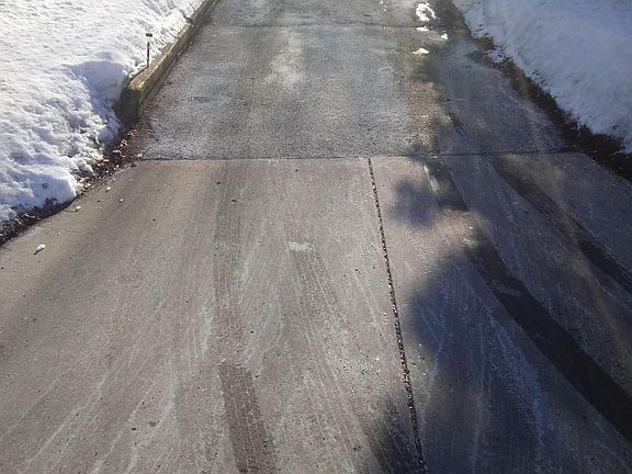 Bottom of driveway. Hill a little steep