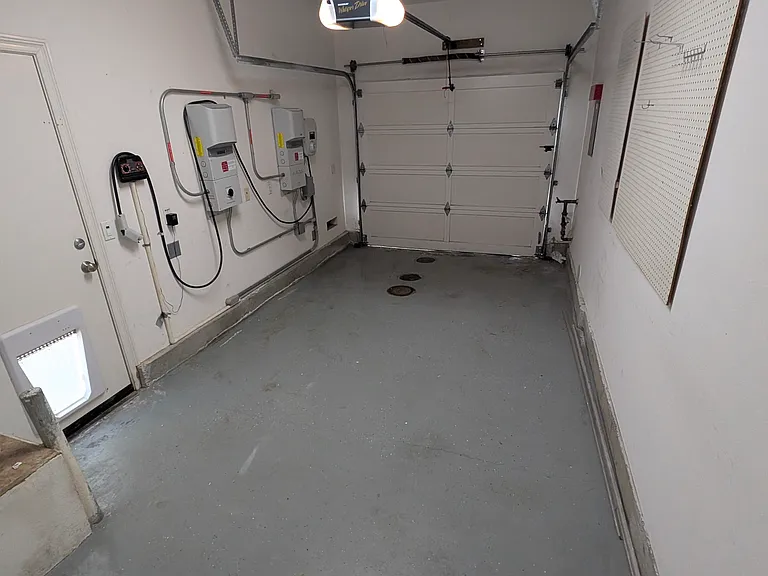 Small Garage with EV charger and Solar inverters