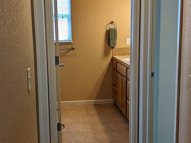 Hallway (toward 2 bedrooms and private full bathroom)