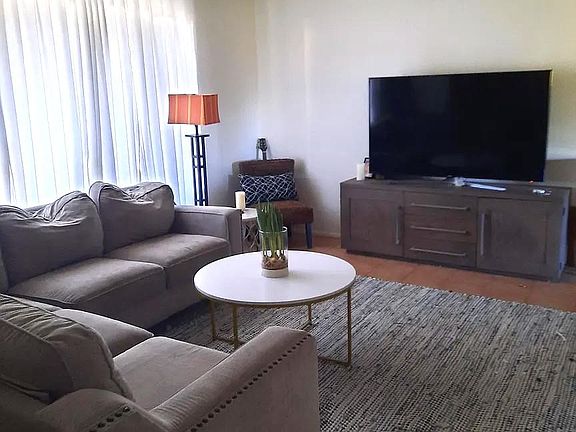 Front living room, open to cul de sac