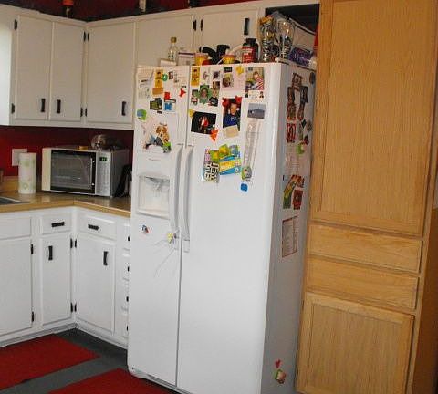 Kitchen cabinet will be painted white as well as new vinyl floors to be added