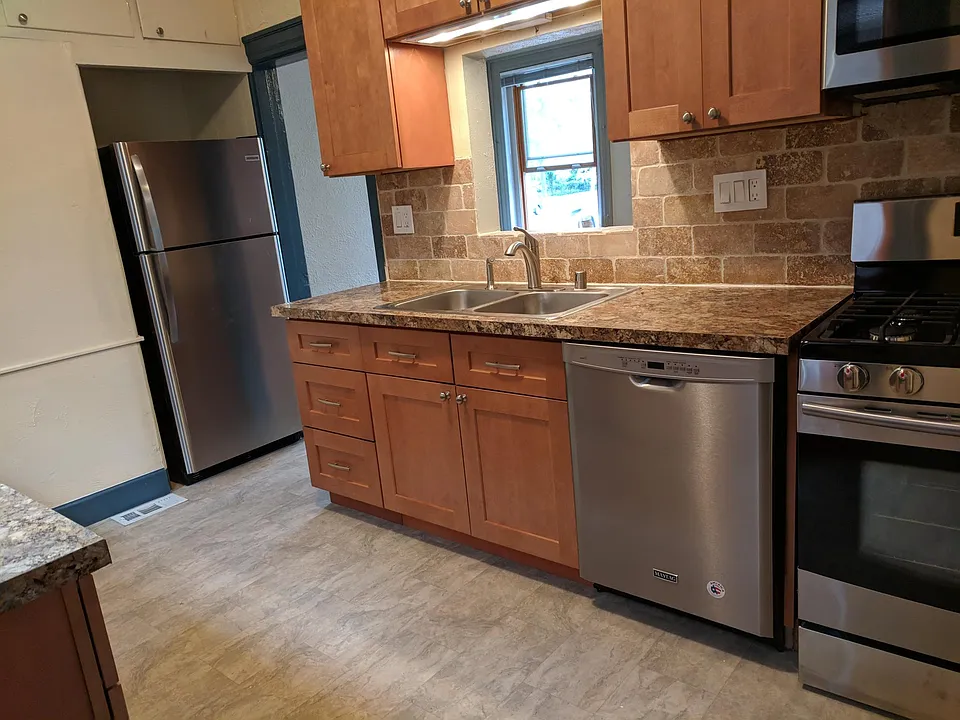 Updated kitchen with gas stove and dishwasher