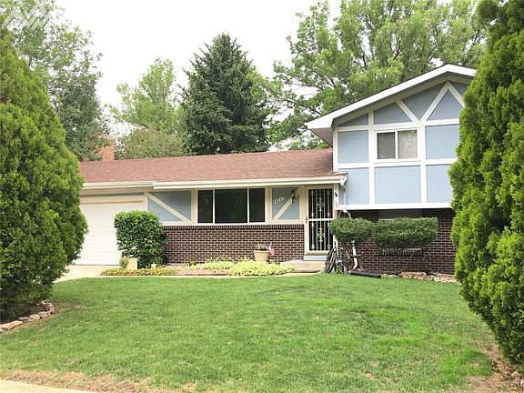 Wonderful 4-level home with fantastic yard and newer roof.