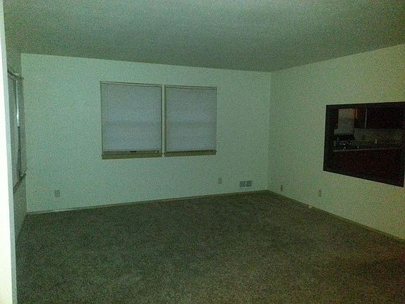 Living room with a pass through to the kitchen.