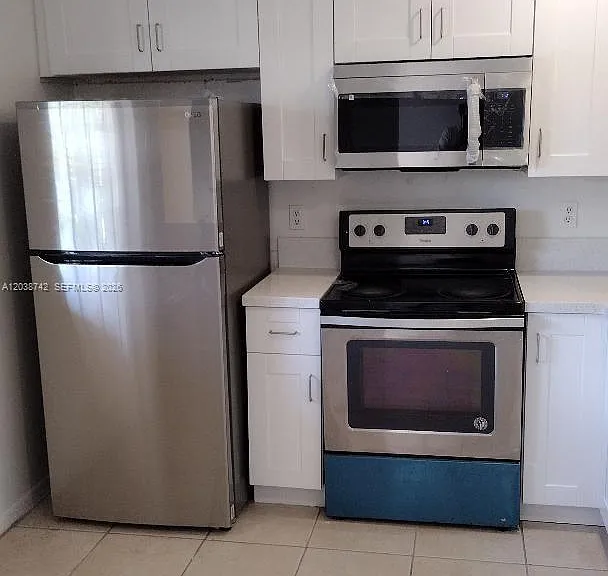 1151 NE 210th Ter #1151 — Photo 2