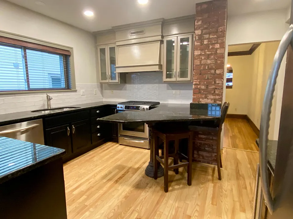 Eat-In kitchen with granite and custom tile