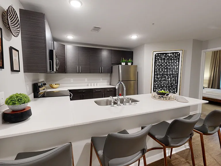 The Cedar includes a modern kitchen with a large breakfast bar. The Cedar includes a modern kitchen with a large breakfast bar.
