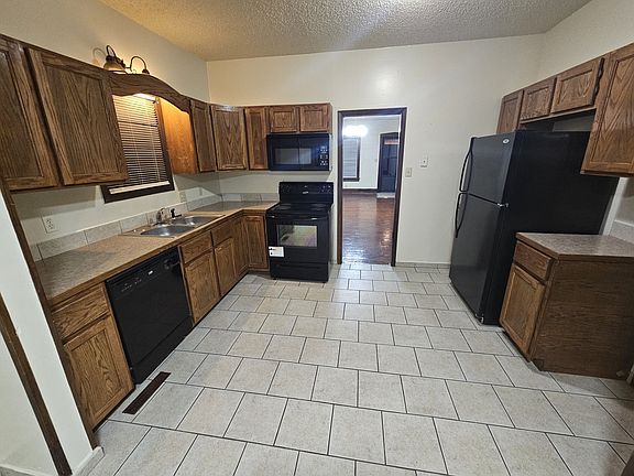 Stove, microwave, fridge, dishwasher.