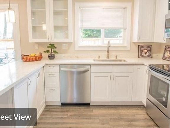 2nd Kitchen photo and access to deck from sliding glass door
