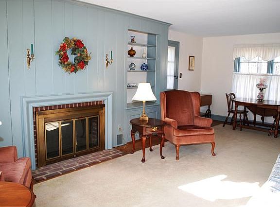 Beautiful wood-burning fireplace in the living rm