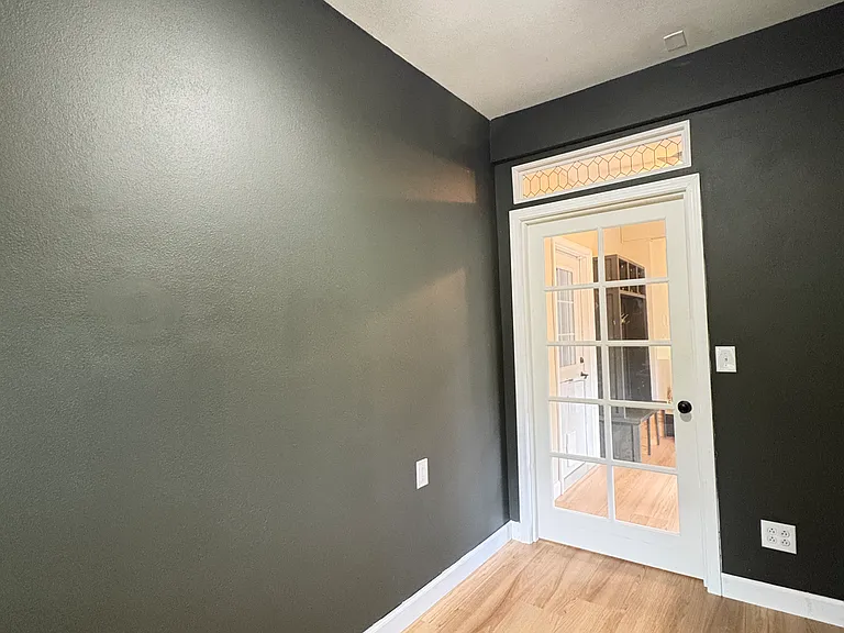 The dedicated office features a hardwired high-speed connection for convenience and reliability. A glass-paned door provides timeless character, which offers a way for others to see when you're busy to avoid unnecessary interruptions.