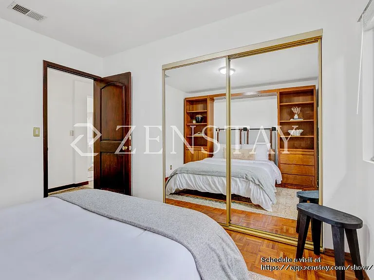 Comfortable bedroom with queen bed and inviting layout