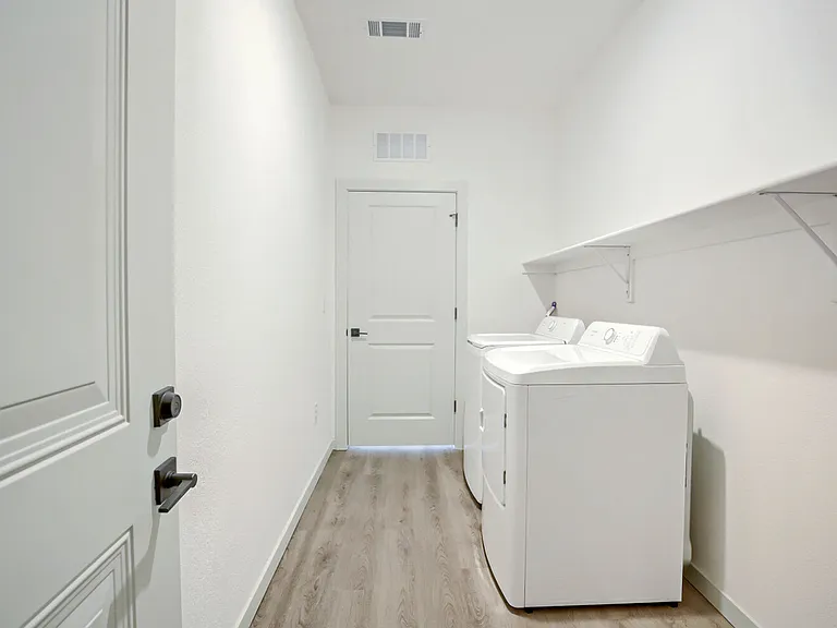 Full-size washer and dryer included in your own private laundry room _ no shared laundry, no hassle. Garrett Harvest Junction West, Longmont, CO.