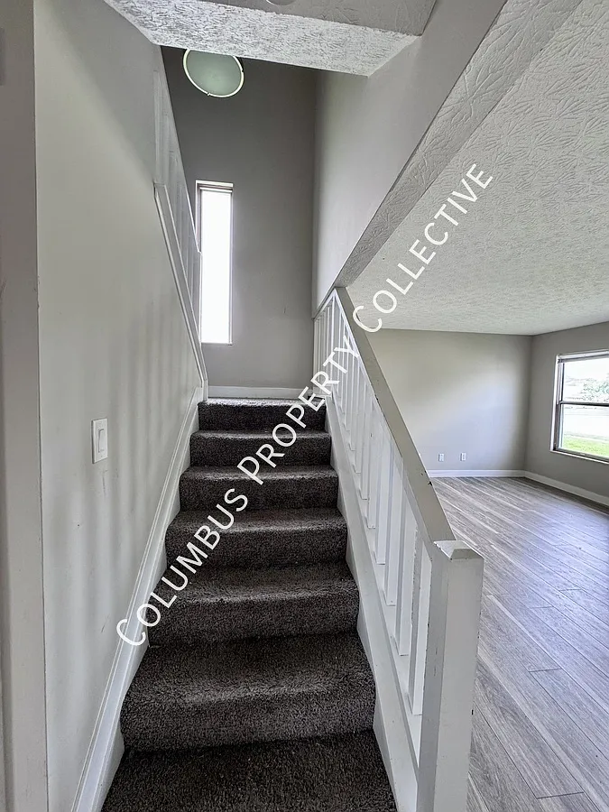Freshly Updated 3-Bedroom Duplex with Garage, Basement & Private Deck — Photo 3