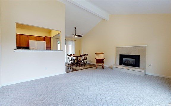 Spacious Living Room with Vaulted Ceilings and Gas Fireplace
