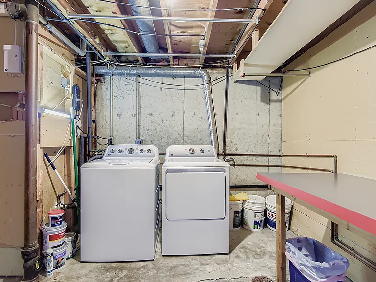 Storage room with private washer/dryer