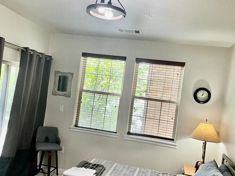 Primary Bedroom - king bed walk in closet and walk out patio.