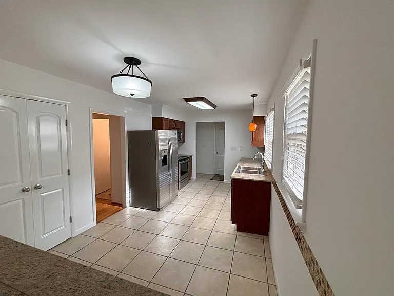 Kitchen (hallway on left and garage entrance next to stove)