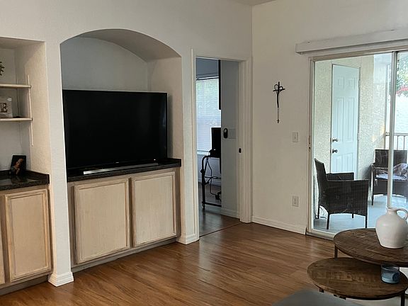 Living Room, Master Bedroom and Balcony.