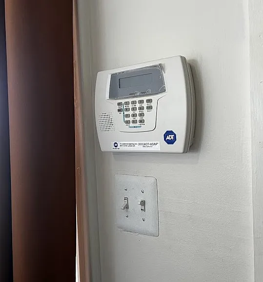 Front door alarm pad