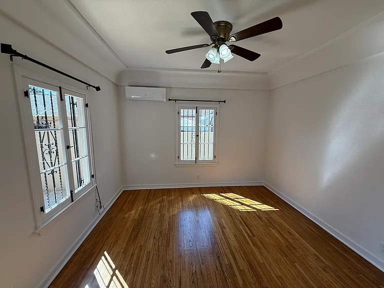 Primary Bedroom with new french windows and Central A/C