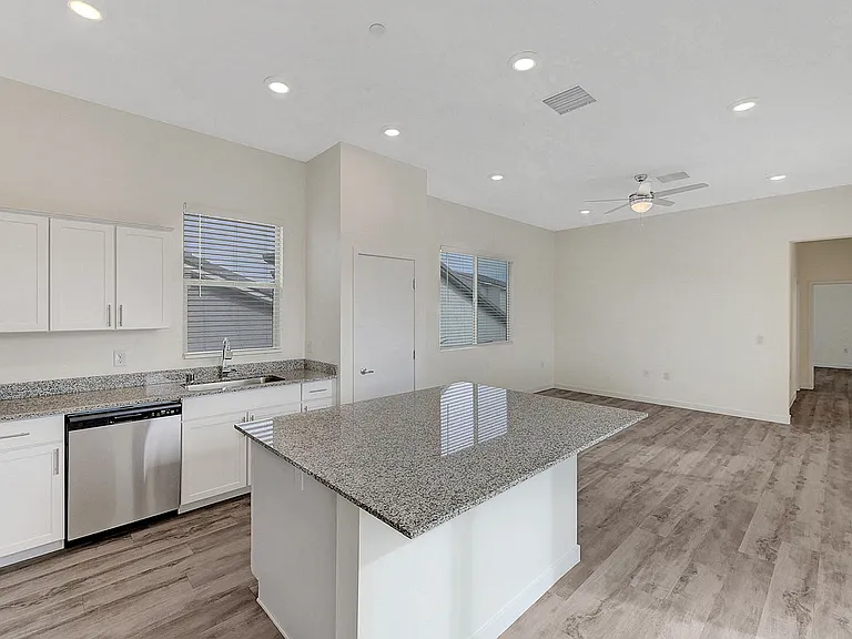 Experience the elegance and functionality of this open-plan kitchen and living space.