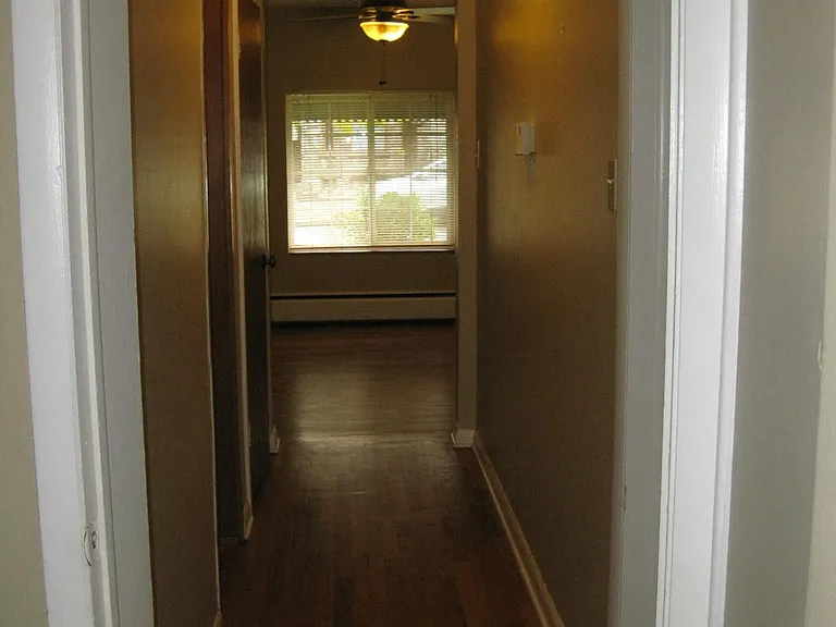 Classic wood floors. Plenty of storage with hall linen closet.