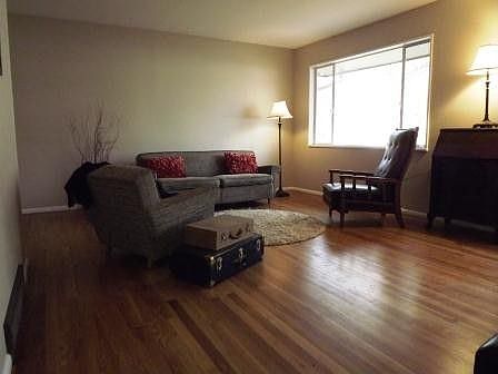 LIVING ROOM WITH LARGE PICTURE WINDOW