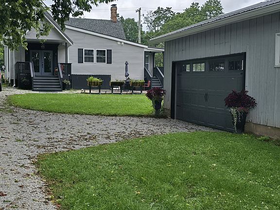 View from private alley entrance. Two car garage with storage space.